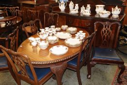 A mahogany sideboard, extending table and six chairs