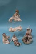 Four Lladro figures and four Nao figures (8)