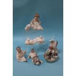 Four Lladro figures and four Nao figures (8)