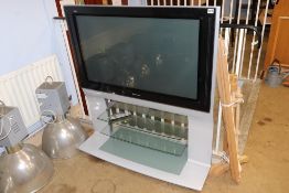 A Panasonic Viera TV and stand (with remote)