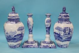 A large pair of Spode Italian candlesticks and a pair of jar and covers