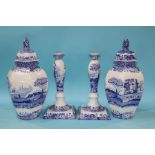 A large pair of Spode Italian candlesticks and a pair of jar and covers