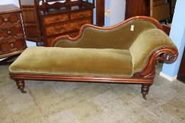 A Victorian mahogany chaise longue