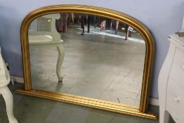 A modern gilt overmantel mirror