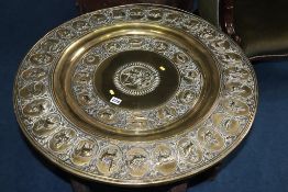 An ornate brass Indian folding table