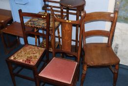 A towel rail, bamboo table and various chairs etc.