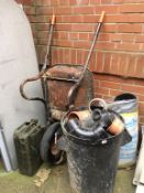 A Jerry can, wheel barrow etc.