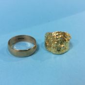 A ring stamped '750', 10g and a 9ct ring. 3.4g