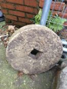 A limestone wheel. 47cm diameter