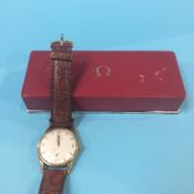 A gents 9ct gold Omega wristwatch, with box