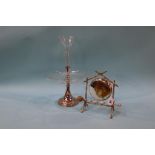 A glass epergne and a table dinner gong
