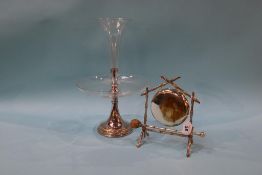 A glass epergne and a table dinner gong