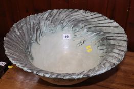 A large modern 'Swirling' design bowl. 40cm diameter