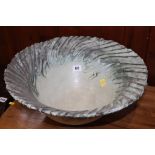 A large modern 'Swirling' design bowl. 40cm diameter
