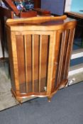 A walnut china cabinet