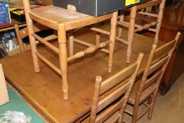 A pine table and six chairs