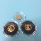 Three small gold coins