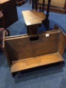 A small oak bookstand and a two division table top book stand and a basket chair