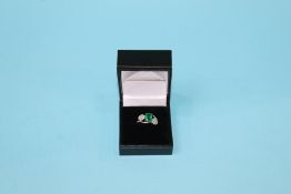 A white gold diamond emerald ring, 4.3 grams, size N