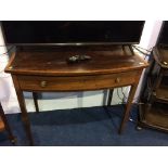 An Edwardian mahogany bow front single drawer side table, 92cm width