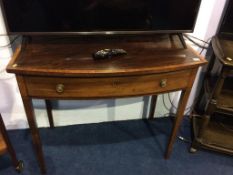 An Edwardian mahogany bow front single drawer side table, 92cm width