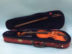 A modern Chinese violin, bow and soft case