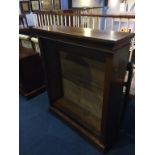 A mahogany open bookcase