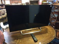 A JVC TV, with remote