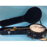 A Vega 'Vegaphone' professional banjo and case