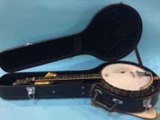 A Vega 'Vegaphone' professional banjo and case