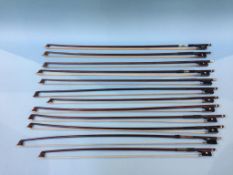 Twelve unnamed violin bows