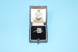 A white metal diamond ring, stamped PT 950, approx. 0.5 carat, 3.2 grams, size Q