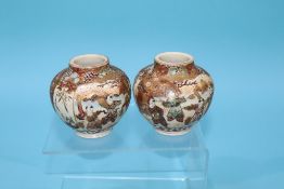 A pair of Japanese Satsuma vases, 7.5cm height x 8cm width approx.