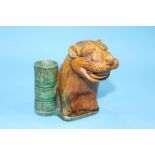 An ochre figure of a Lion, 13cm height x 10cm width approx.