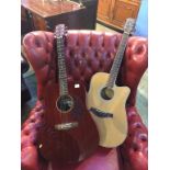 A Well Barn model W-215C guitar and an Axl guitar