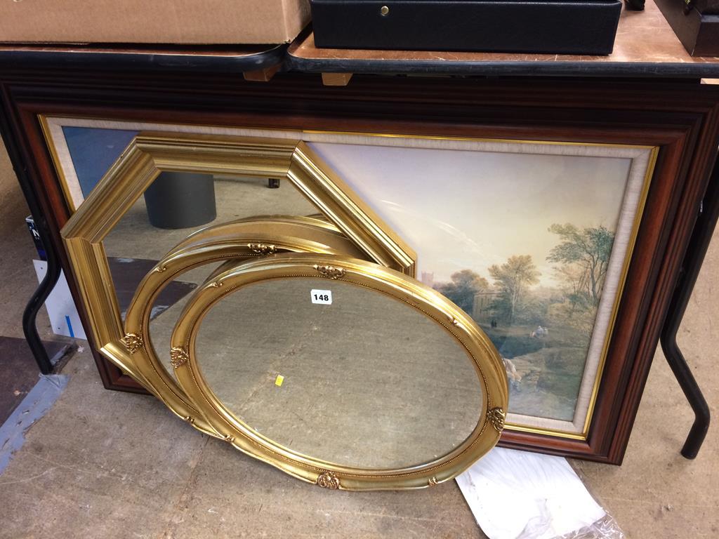 Gilt framed mirrors and a print