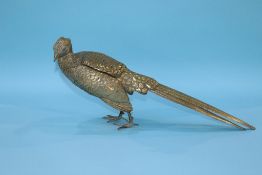 A gilt bronze pheasant, signed, 24cm height x 57cm width approx.