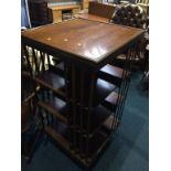 A mahogany revolving bookcase