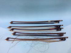 Five double bass bows