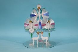 A decorative glass group of three peacocks and two glass deer, 38cm height
