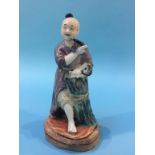 A famille verte figure on stand, 15.5cm height x 8cm width approx.