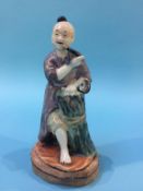 A famille verte figure on stand, 15.5cm height x 8cm width approx.