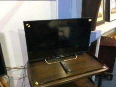 A Sony TV, with remote