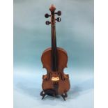 A violin labelled Antonius Stradivarius Cremonesis, 37cm (Length of back)