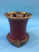 A Sang de Boeuf brush pot with ormolu mounts, 18cm height x 15cm width approx.