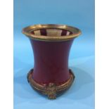 A Sang de Boeuf brush pot with ormolu mounts, 18cm height x 15cm width approx.