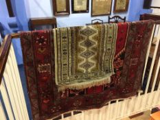 A Hamadan rug and a smaller rug