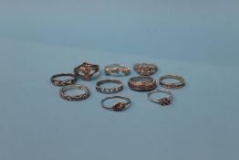 A collection of silver and costume jewellery rings