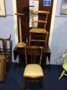 A reproduction mahogany sofa table, two pedestals and chairs