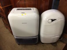 A silver Crest and Ebac de-humidifier